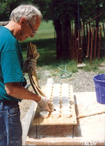 Filling the bell castings for the column capitals